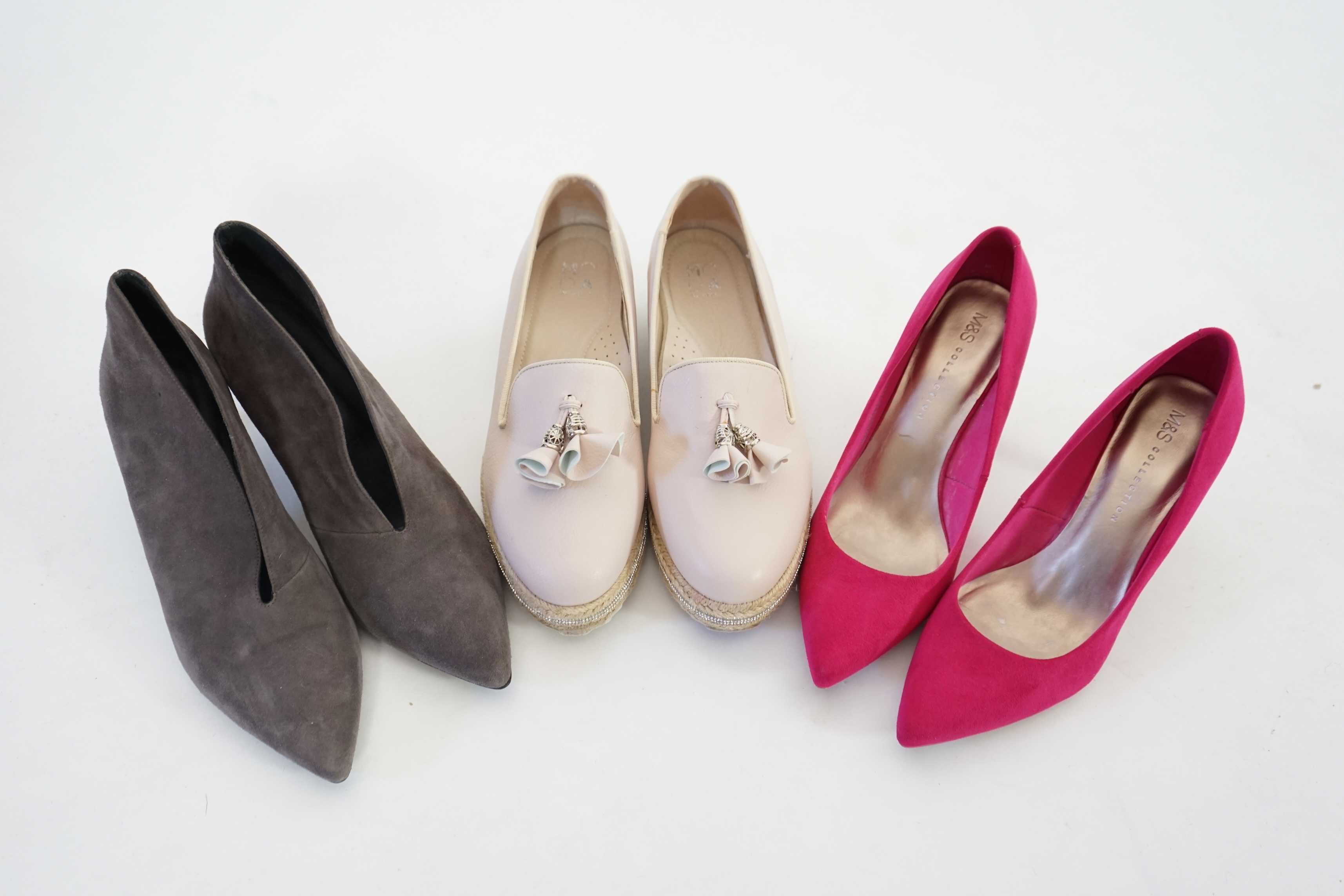 Three pairs of lady's shoes, Jigsaw V front shoe boot size 39, Marks & Spencer bright pink suede size 5.5 and a pair of Moda in Pelle buff platformed flats with metallic silver strip through sole. Proceeds to Happy Paws